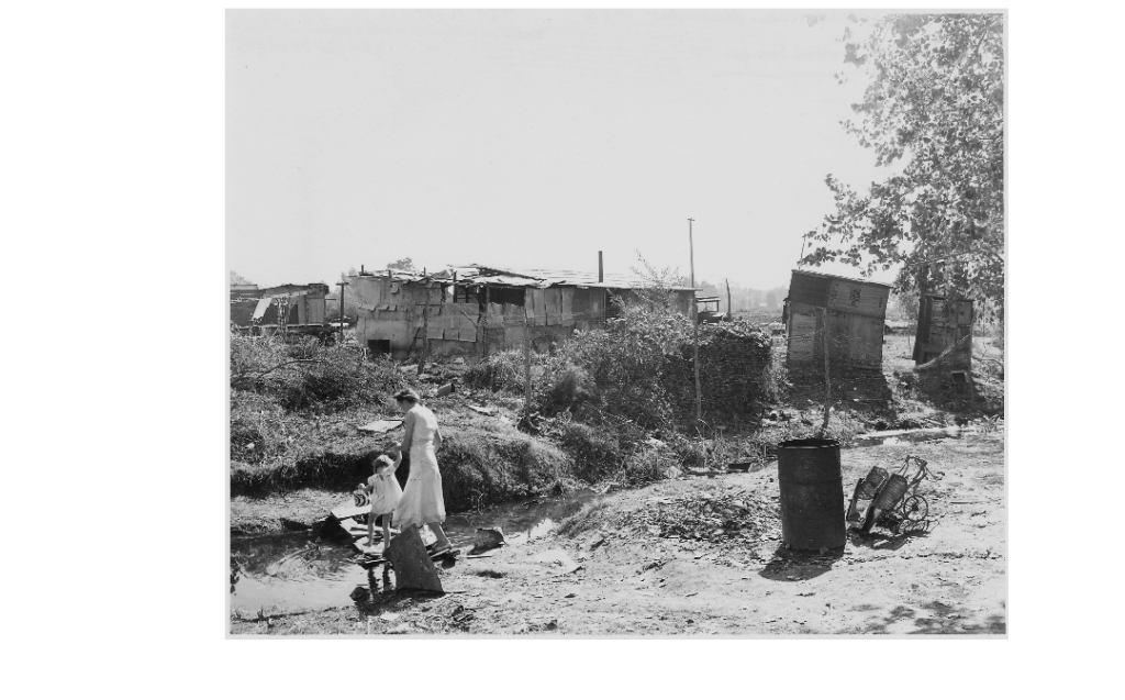 A-photograph-by-Dorothea-Lange-of-a-squatter-camp-in-California-1936-1